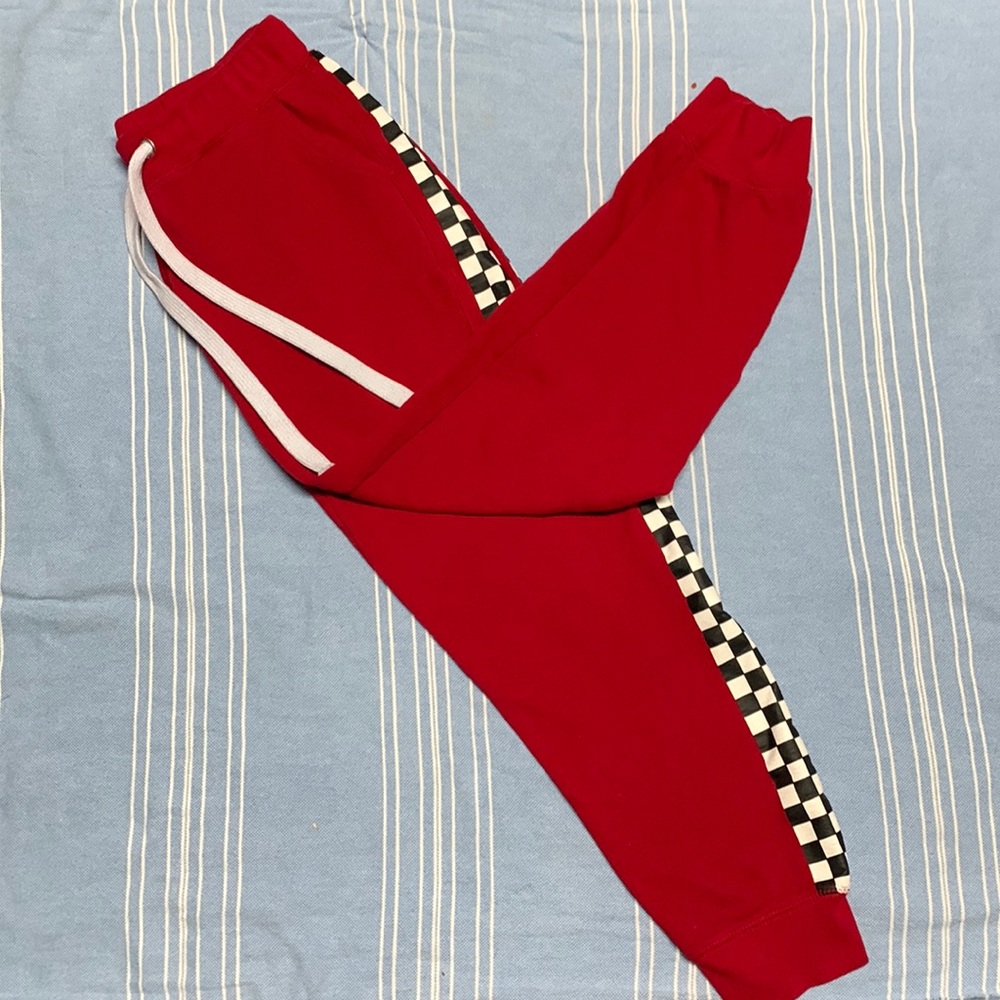One pair of red checkered sweatpants